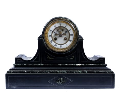 A LATE 19TH CENTURY BLACK MARBLE MANTLE CLOCK, the drum shaped movement with white enamel dial and visible escapement, eight 