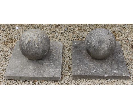 A PAIR OF STONE BALL FINIAL GATE POST TOPS, 41cm high