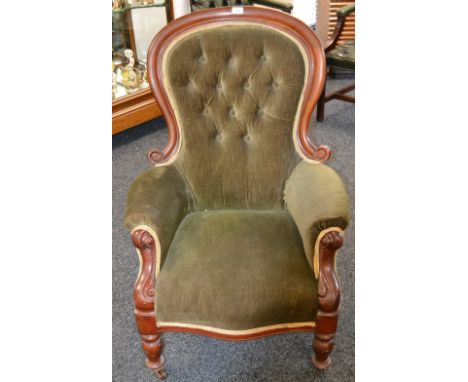 A Victorian mahogany spoonback chair, button upholstered back, scrolling arms, serpentine stuffed overseat, turned forelegs, 