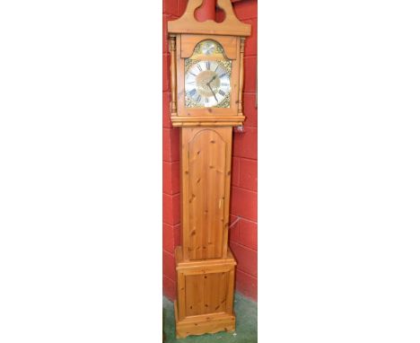 A modern pine longcase style clock