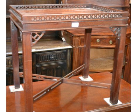 A Chippendale style mahogany lamp or silver table 