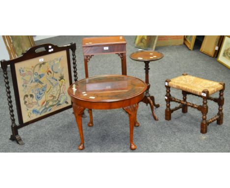 An oak rush seated stool; an oak barley twist fire screen; a reproduction mahogany side table, with pull out slide; a reprodu