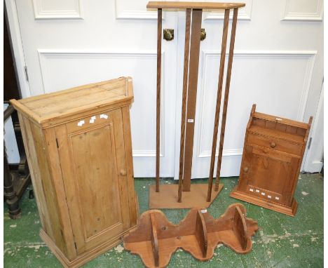 A Victorian stripped pine wall cupboard with adjacent corner shelving; a corner wall shelf; a small pine wall cabinet, panel 