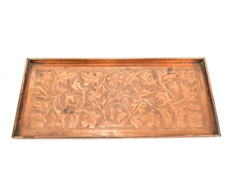 KEWSICK SCHOOL OF INDUSTRIAL ART; an Arts and Crafts rectangular copper tray with repoussé decoration depicting floral spray,