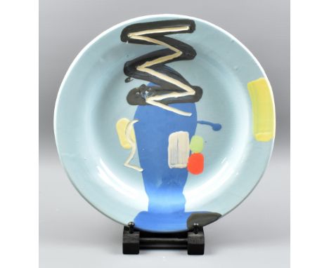 BRUCE McLEAN (born 1944); a large earthenware plate with brush and incised decoration on pale blue ground, painted signature 