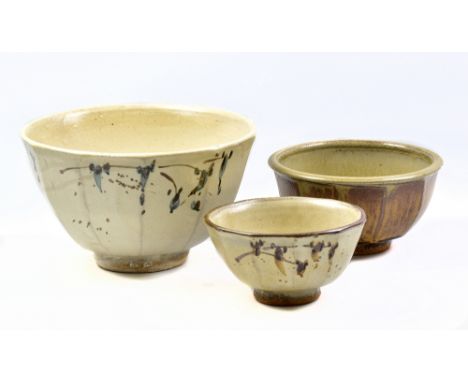 JIM MALONE (born 1946); three faceted stoneware footed bowls, two with brush decoration on cream ground, impressed JM and A f