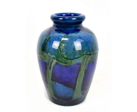 WILLIAM MOORCROFT; a 'Moonlit Blue' vase of shouldered cylindrical form with rolled neck, blue signature and impressed marks 