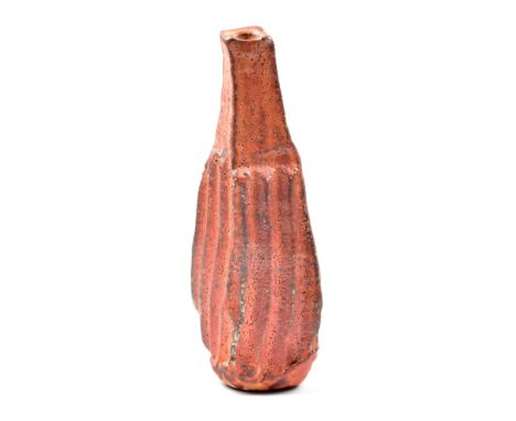 KATERINA EVANGELIDOU; a salt glazed bottle form with ribbed body, impressed K mark, height 26cm. (D) Provenance: Purchased fr