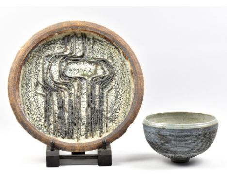 VICTOR PRIEM (1925-1989); a shallow stoneware wall plaque with abstract figurative decoration, incised signature and dated 19