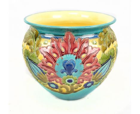 BURMANTOFTS FAIENCE; an art pottery jardinière with tubelined decoration depicting stylised flowers and motifs, impressed mar