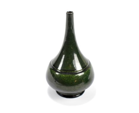 ROYAL LANCASTRIAN; a glazed conical bottle vase, finished in a mottled green glaze, impressed marks numbered 3029, circa 1914