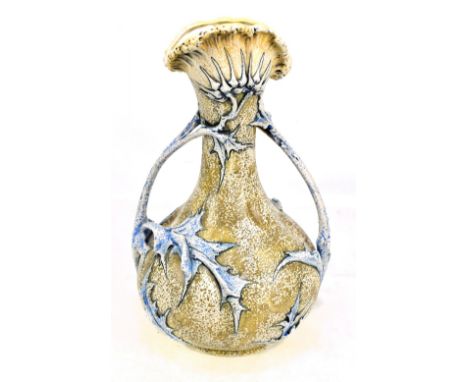 AMPHORA; an Art Nouveau twin handled vase relief decorated with floral sprays, manufacturer's marks numbered 3852 to base, he