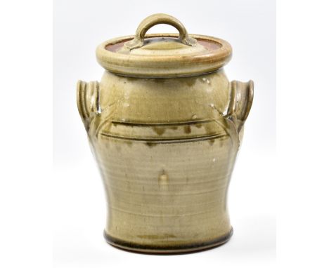 RICHARD BATTERHAM (born 1936); a early twin handled stoneware jar and cover, green ash glaze, height 25.5cm. (D)Additional In