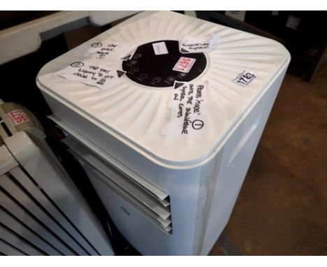 Portable air conditioner with remote control. All electrical items in this lot have been PAT tested for safety and have passe