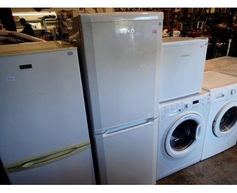 Beko frost free combi fridge freezer, CDA539FW-254 x 54 x 154H. All electrical items in this lot have been PAT tested for saf