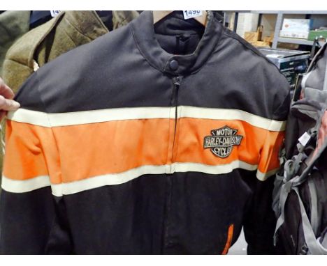 Harley Davidson motorbike jacket and two pairs of motorcycle trousers. Not available for in-house P&amp;P 