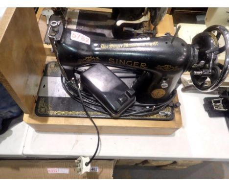 Singer electric sewing machine. All electrical items in this lot have been PAT tested for safety and have passed. This does n