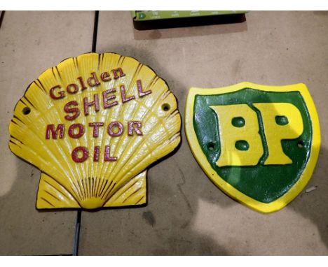 Two cast iron signs, Shell Motor Oil and BP, L: 20 cm. UK P&amp;P Group 2 (£20+VAT for the first lot and £4+VAT for subsequen