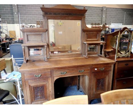 Antique 1980s Victorian 183 x 6 x 218 cm, ornate oak buffet with bevelled mirror and three drawers over two cupboards. Not av