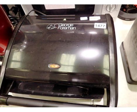 Large George Foreman grill together with an 'American' popcorn maker. Both in good working order. All electrical items in thi