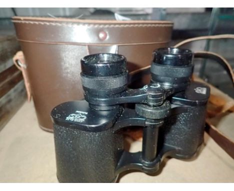Leather cased pair of Beck Kassel 8x30 binoculars. UK P&amp;P Group 2 (£20+VAT for the first lot and £4+VAT for subsequent lo