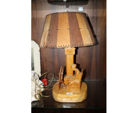 A CARVED TREEN FIGURATIVE LAMP SIGNED TO BASE