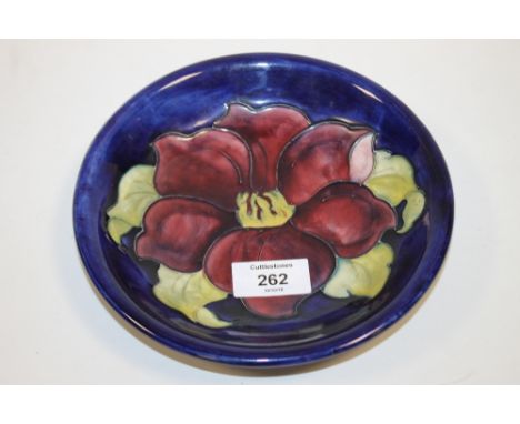 A VINTAGE FLORAL MOORCROFT DISH