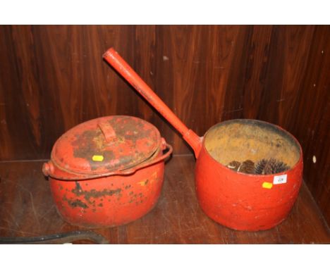A VINTAGE CAST IRON PAN TOGETHER WITH ANOTHER