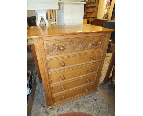 A LIGHT OAK FIVE DRAWER CHEST