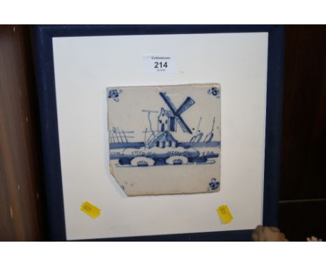 A VINTAGE FRAMED DELFT STYLE TILE 