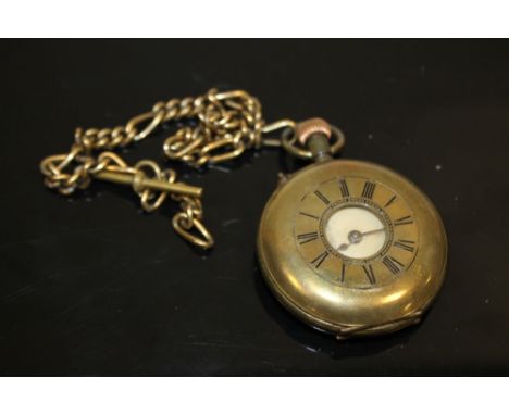 A VINTAGE HALF HUNTER POCKET WATCH ON CHAIN