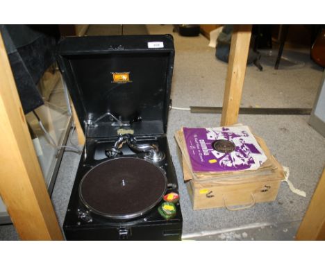 A VINTAGE PORTABLE HMV WINDUP GRAMMAPHONE TOGETHER WITH A QUANTITY OF 78'S, NEEDLES ETC
