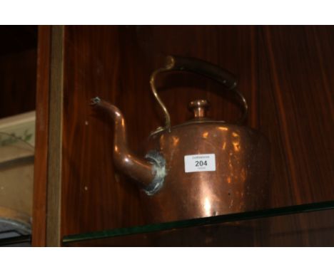 A VINTAGE COPPER KETTLE 