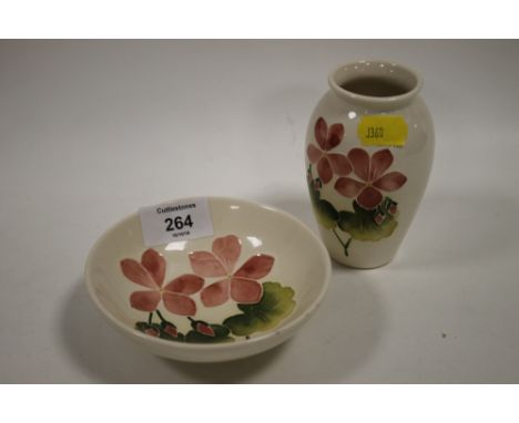 A VINTAGE MOORCROFT BOWL TOGETHER WITH A MATCHING VASE