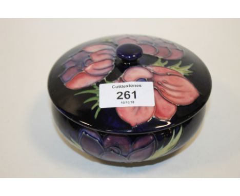 A VINTAGE MOORCROFT ANEMONE PATTERN LIDDED TRINKET POT