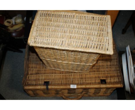 A LARGE WICKER HAMPER AND A LAUNDRY BASKET