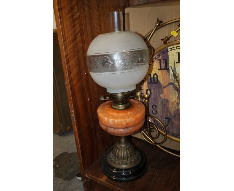 A VINTAGE OIL LAMP WITH SHADE 