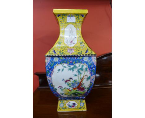 A Chinese famille jaune porcelain vase 