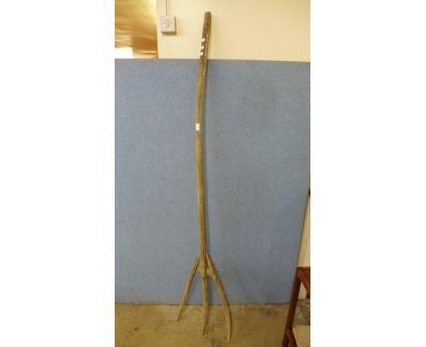 A wooden hay fork 