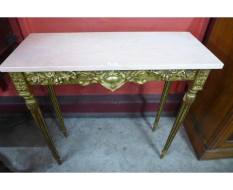 An Italian style gilt gesso and marble top console table 