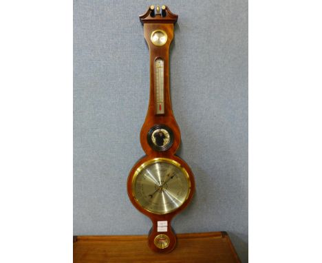 A Comitti of London mahogany aneroid barometer 