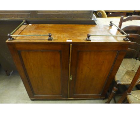A George III mahogany cupboard and a commode 