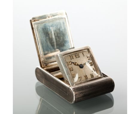 STERLING SILVER PURSE WATCH
the case with sliding close and engine turned design, the square dial with Arabic numerals, marke