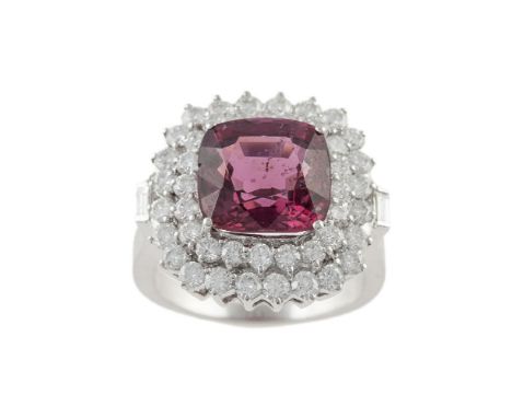 A diamond and spinel ring, the cushion mixed-cut spinel to a stepped double surround of round brilliant-cut diamonds with bag