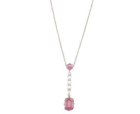 A diamond and pink topaz pendant, the rectangular step-cut pink topaz surmounted by a row of spaced round brilliant-cut diamo