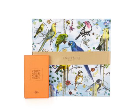 A set of Hermes scarf Knotting Cards and a Christian Lacroix Bird's Sinfonia two-sided puzzle, with maker's boxes- New sealed