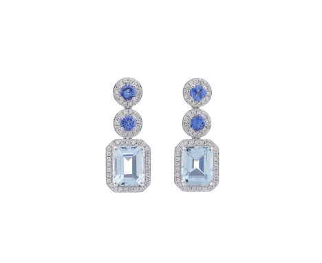 A pair of platinum aquamarine and brilliant-cut diamond cluster drop earrings, with sapphire and diamond double cluster surmo