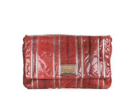 Dolce &amp; Gabbana, a large Miss Lexington red snakeskin clutch, featuring bronze leather striped details and smooth red lea