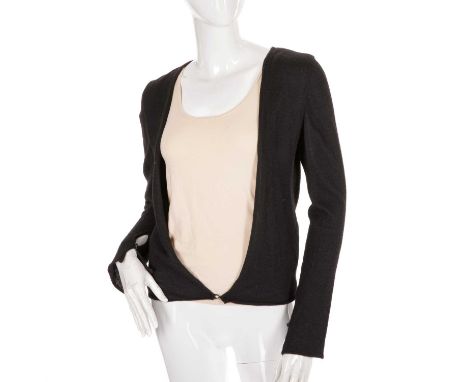 Chanel, a black cashmere cardigan, featuring CC detailed buttoned cuffs and one small button closure to the lower front, labe