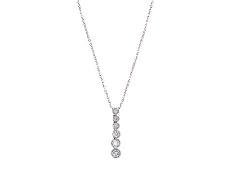 Tiffany &amp; Co., a platinum graduated brilliant-cut diamond line Jazz pendant, suspended from a platinum trace-link chain, 